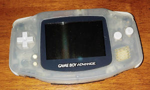 Translucent, light purple, slightly oval-shaped slab with a screen and buttons.