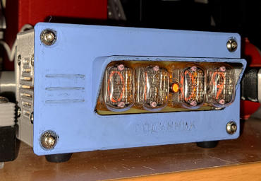 The same front plate roughly painted a pastel blue